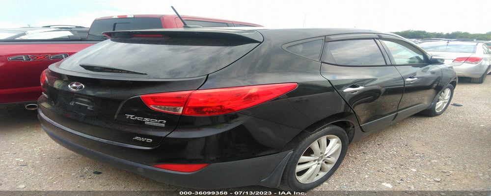 KM8JUCAC1CU382325 2012 HYUNDAI TUCSON photo no. 4