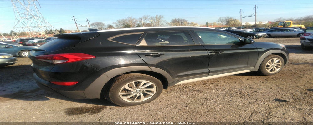 KM8J33A40JU612235 2018 HYUNDAI TUCSON photo no. 4