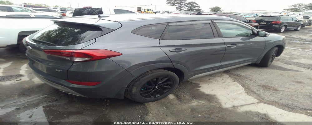 KM8J33A24HU359476 2017 HYUNDAI TUCSON photo no. 4