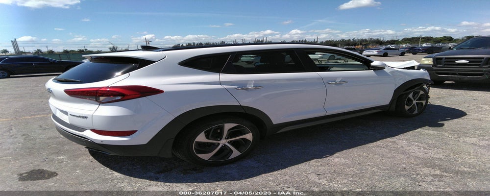 KM8J33A22GU247872 2016 HYUNDAI TUCSON photo no. 4