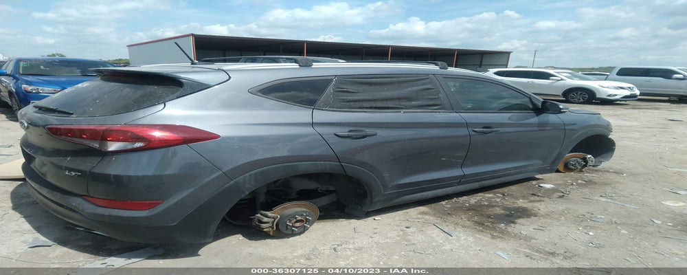 KM8J33A2XGU200525 2016 HYUNDAI TUCSON photo no. 4