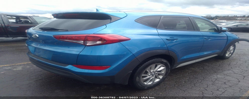 KM8J33A48HU510594 2017 HYUNDAI TUCSON photo no. 4