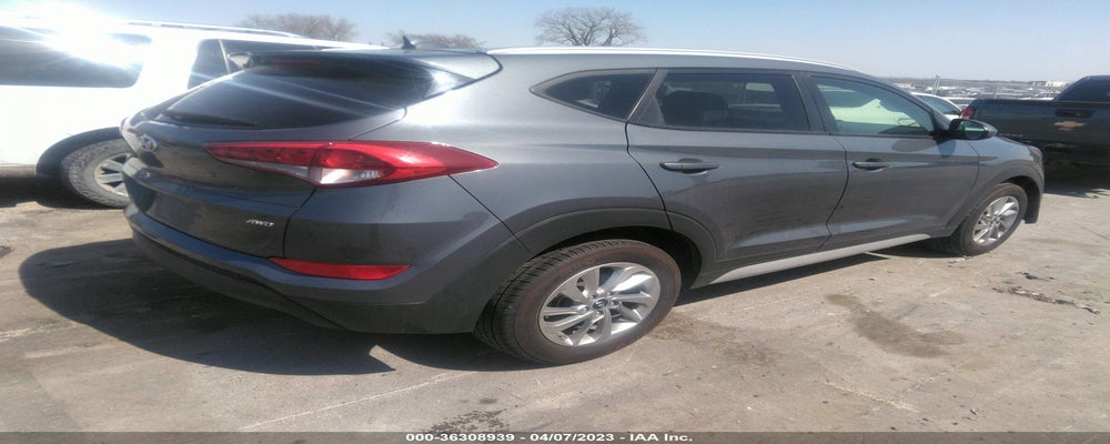 KM8J3CA44JU677654 2018 HYUNDAI TUCSON photo no. 4