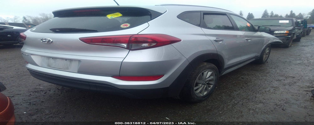 KM8J33A46HU446572 2017 HYUNDAI TUCSON photo no. 4