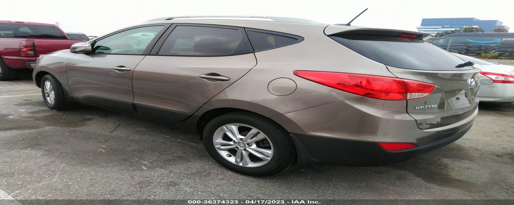 KM8JU3AC9CU357513 2012 HYUNDAI TUCSON photo no. 3