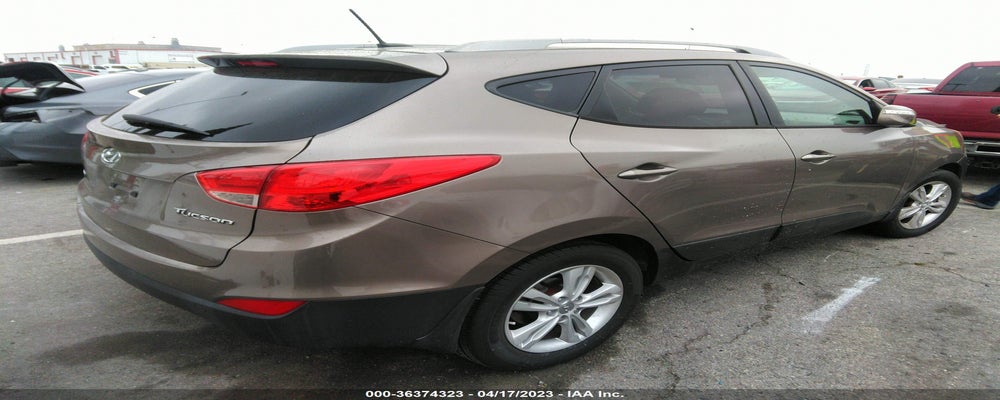 KM8JU3AC9CU357513 2012 HYUNDAI TUCSON photo no. 4