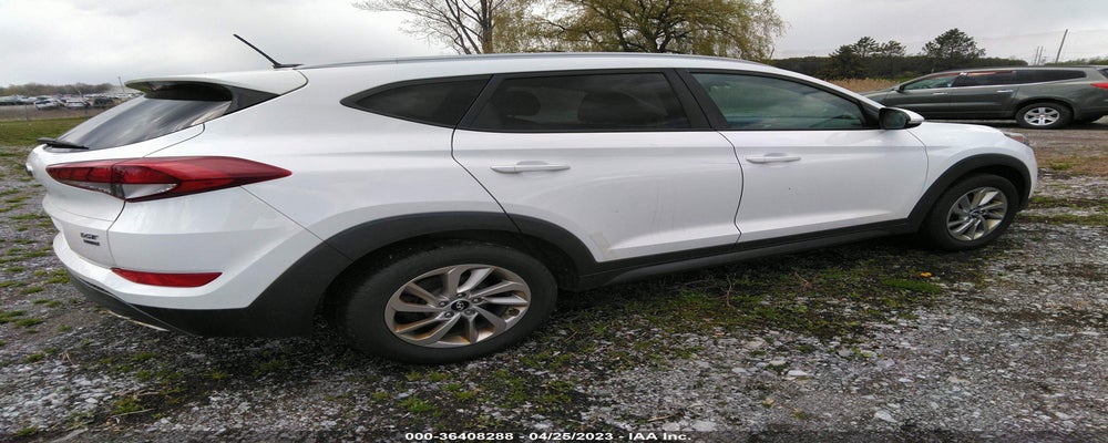 KM8J3CA2XGU104894 2016 HYUNDAI TUCSON photo no. 4