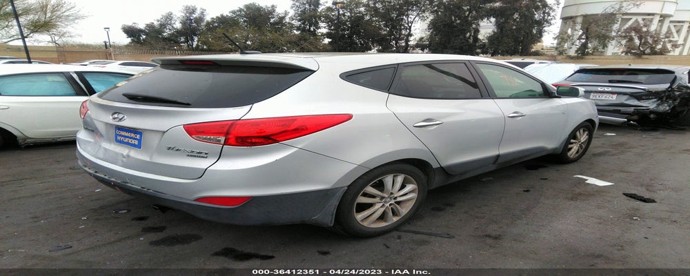 KM8JU3AC6CU357341 2012 HYUNDAI TUCSON photo no. 4