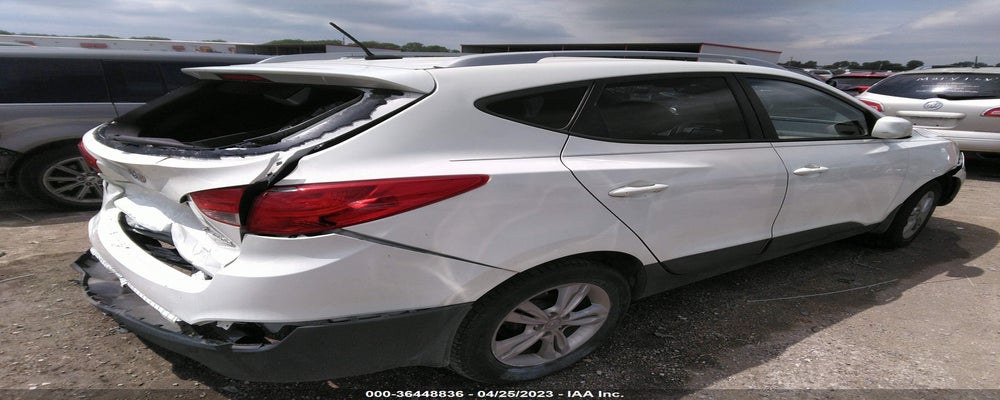 KM8JU3AC5BU219370 2011 HYUNDAI TUCSON photo no. 4