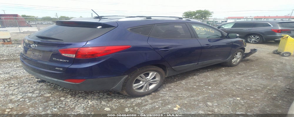 KM8JUCAC5DU615429 2013 HYUNDAI TUCSON photo no. 4