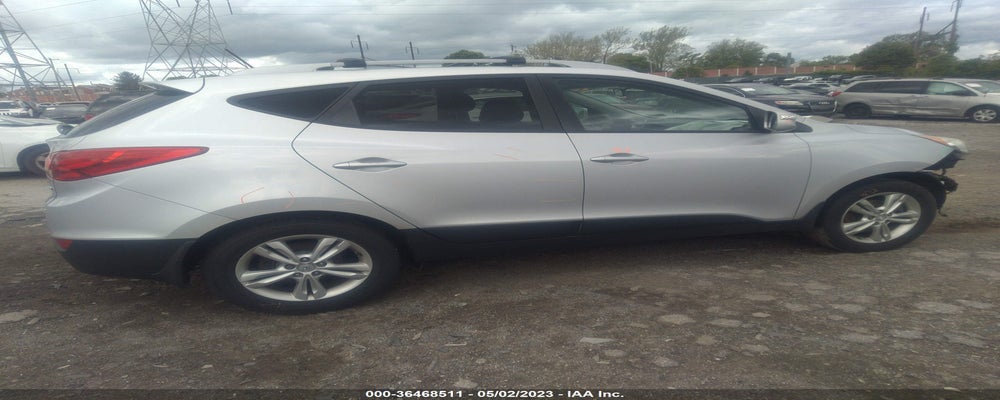 KM8JUCAC1DU568156 2013 HYUNDAI TUCSON photo no. 4