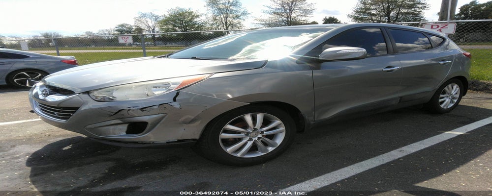 KM8JUCAC9DU744631 2013 HYUNDAI TUCSON photo no. 2