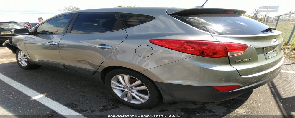 KM8JUCAC9DU744631 2013 HYUNDAI TUCSON photo no. 3