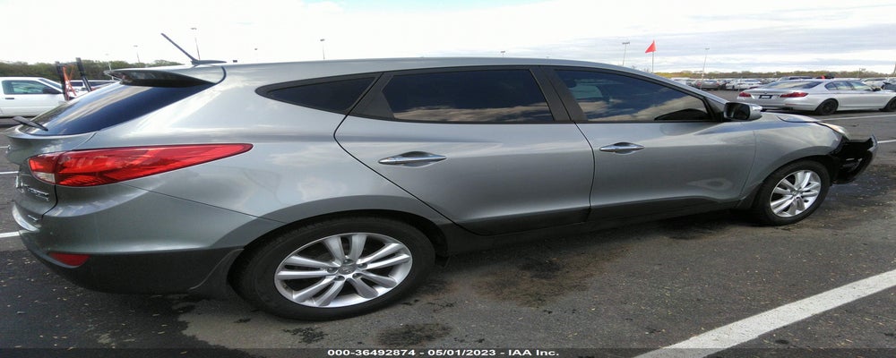 KM8JUCAC9DU744631 2013 HYUNDAI TUCSON photo no. 4