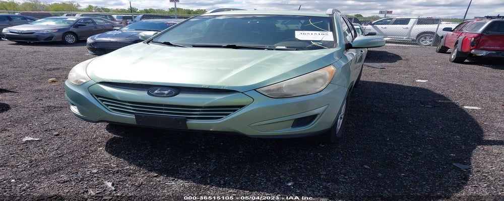 KM8JUCAC7CU466150 2012 HYUNDAI TUCSON photo no. 2