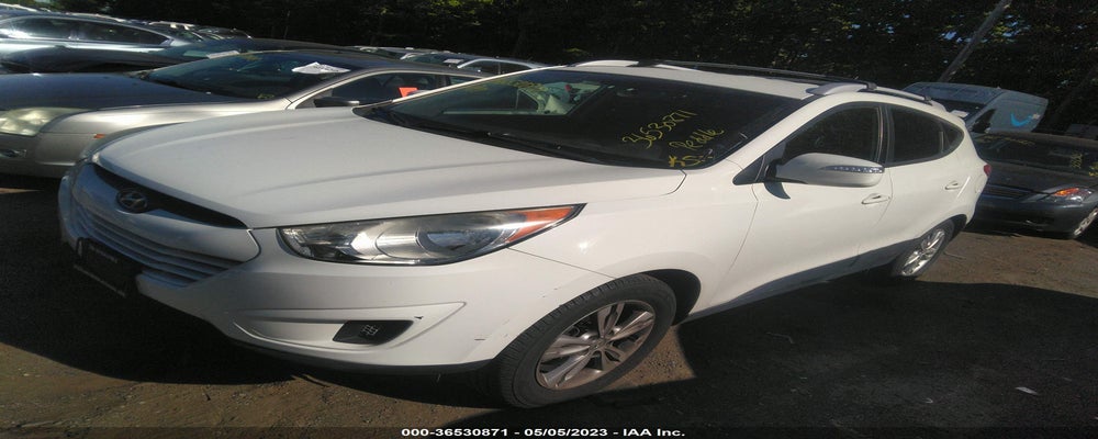 KM8JUCAC9CU423641 2012 HYUNDAI TUCSON photo no. 2