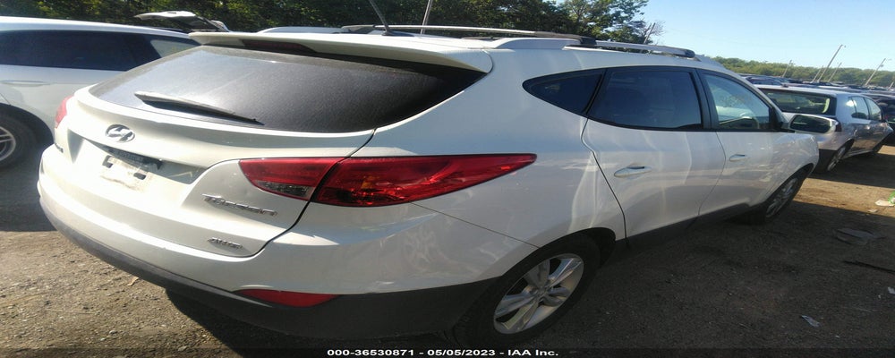 KM8JUCAC9CU423641 2012 HYUNDAI TUCSON photo no. 4