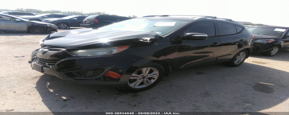 KM8JU3ACXCU423812 2012 HYUNDAI TUCSON photo no. 2