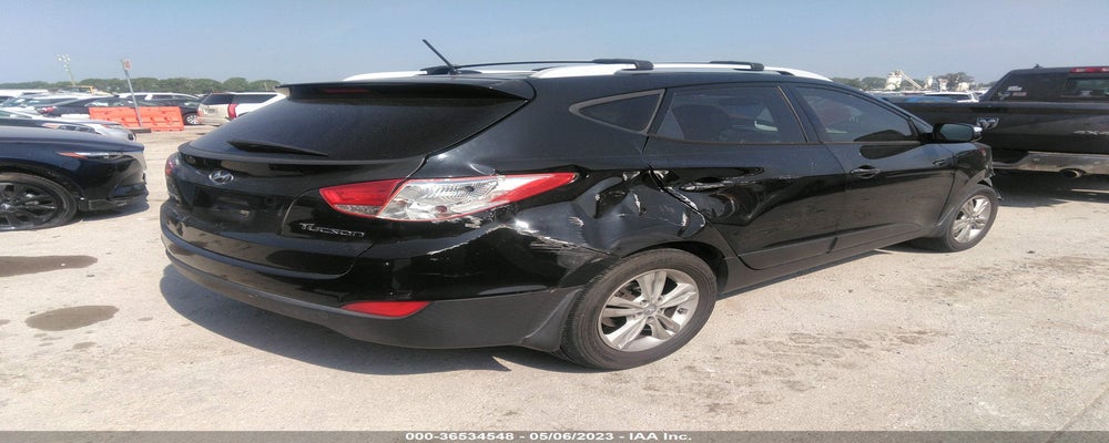 KM8JU3ACXCU423812 2012 HYUNDAI TUCSON photo no. 4
