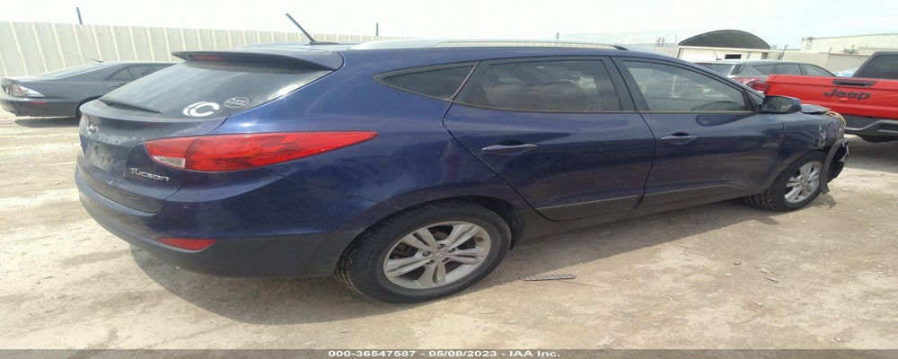 KM8JU3AC0AU089299 2010 HYUNDAI TUCSON photo no. 4