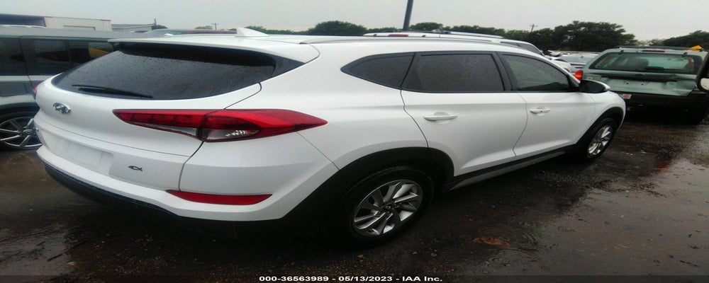 KM8J33A44HU500466 2017 HYUNDAI TUCSON photo no. 4