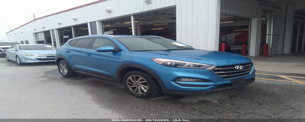 KM8J3CA47GU093080 2016 HYUNDAI TUCSON photo no. 4
