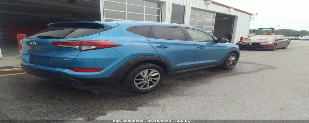 KM8J3CA47GU093080 2016 HYUNDAI TUCSON photo no. 4