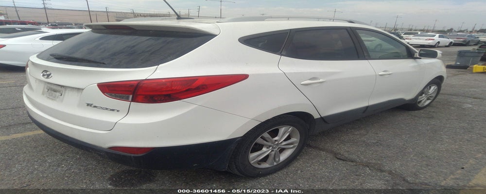 KM8JU3AC5CU389052 2012 HYUNDAI TUCSON photo no. 4