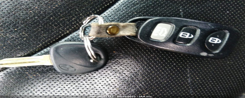 KMHDH6AE1DU006634 2013 HYUNDAI ELANTRA COUPE photo no. 11