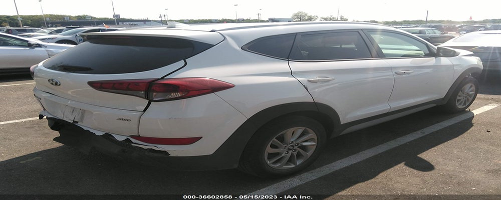 KM8J3CA42JU735924 2018 HYUNDAI TUCSON photo no. 4