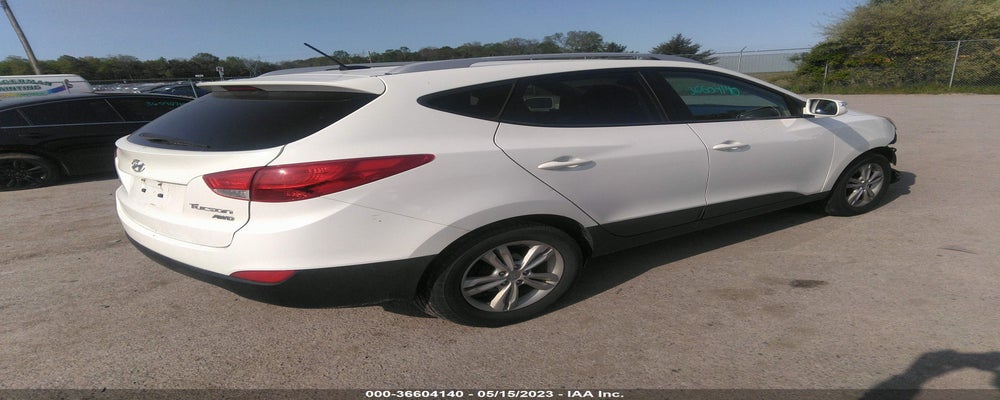 KM8JUCAC9CU395081 2012 HYUNDAI TUCSON photo no. 4