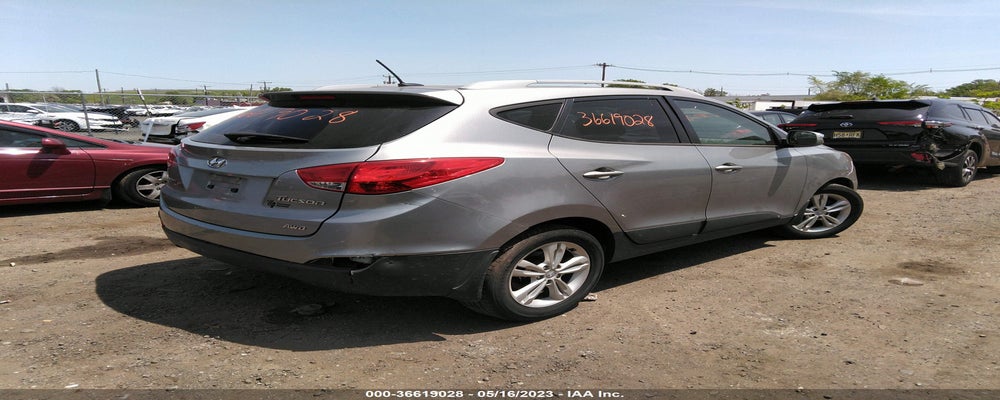 KM8JUCAC4DU573626 2013 HYUNDAI TUCSON photo no. 4