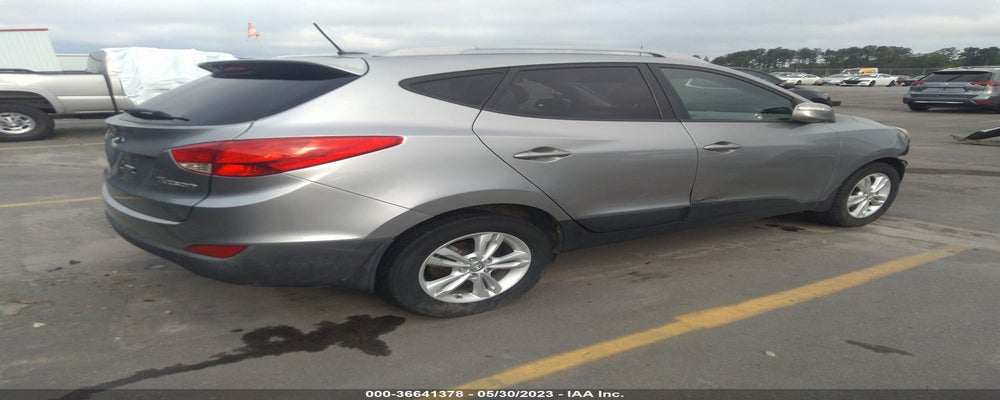 KM8JU3AC3DU550323 2013 HYUNDAI TUCSON photo no. 4