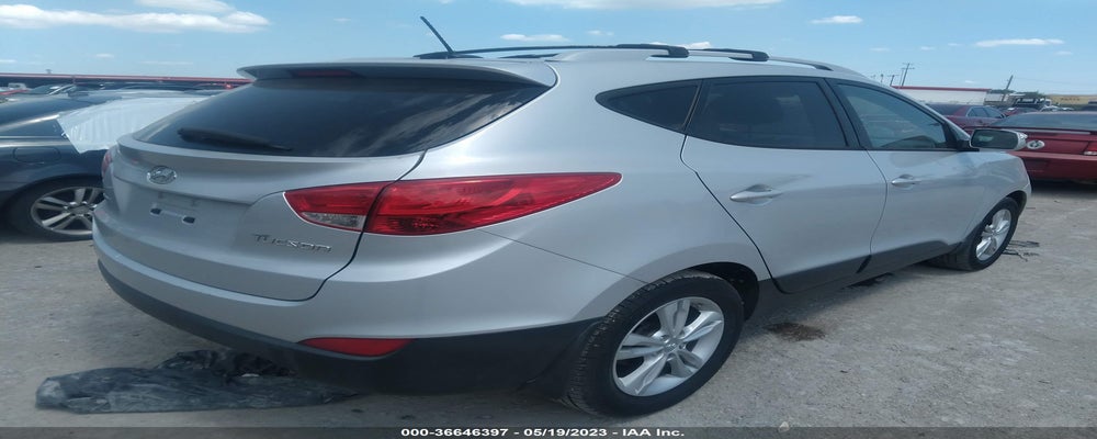KM8JU3AC3CU489991 2012 HYUNDAI TUCSON photo no. 4