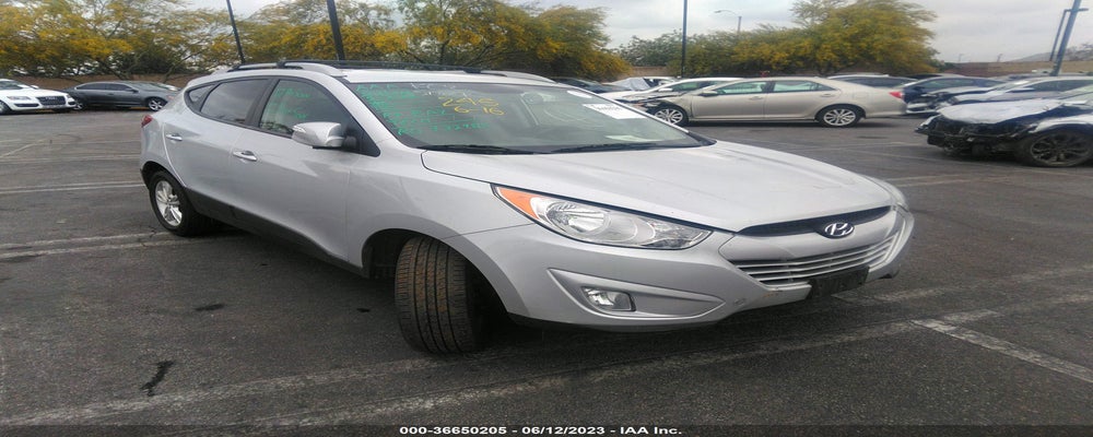 KM8JU3AC2DU615856 2013 HYUNDAI TUCSON photo no. 4