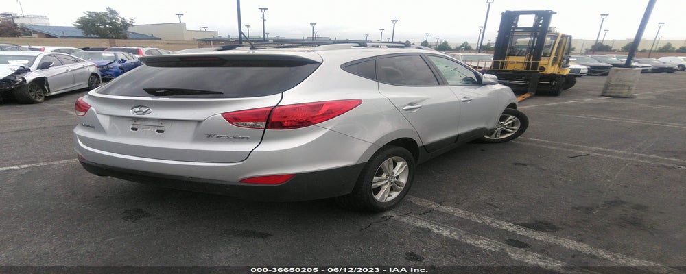 KM8JU3AC2DU615856 2013 HYUNDAI TUCSON photo no. 4