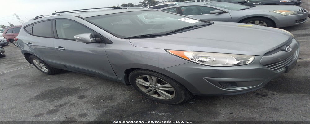 KM8JU3AC8CU487864 2012 HYUNDAI TUCSON photo no. 1