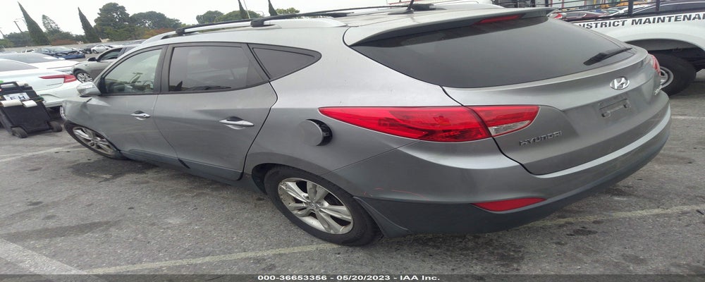 KM8JU3AC8CU487864 2012 HYUNDAI TUCSON photo no. 3