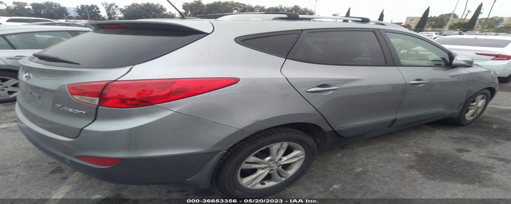 KM8JU3AC8CU487864 2012 HYUNDAI TUCSON photo no. 4