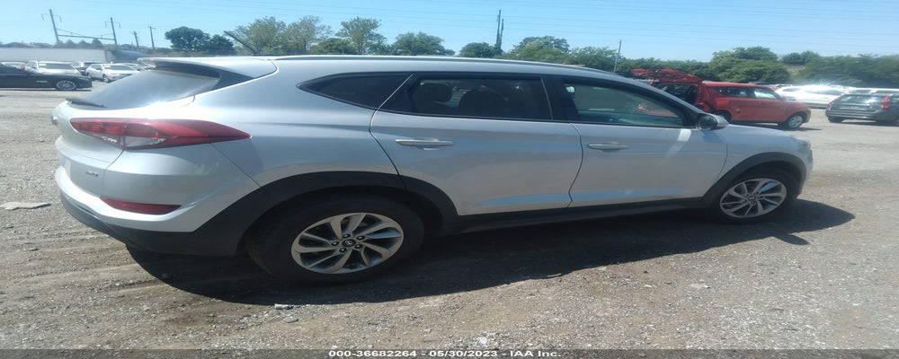 KM8J3CA4XGU139727 2016 HYUNDAI TUCSON photo no. 4
