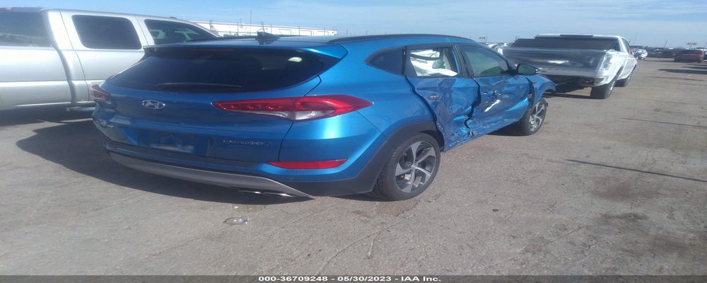 KM8J33A28HU590851 2017 HYUNDAI TUCSON photo no. 4