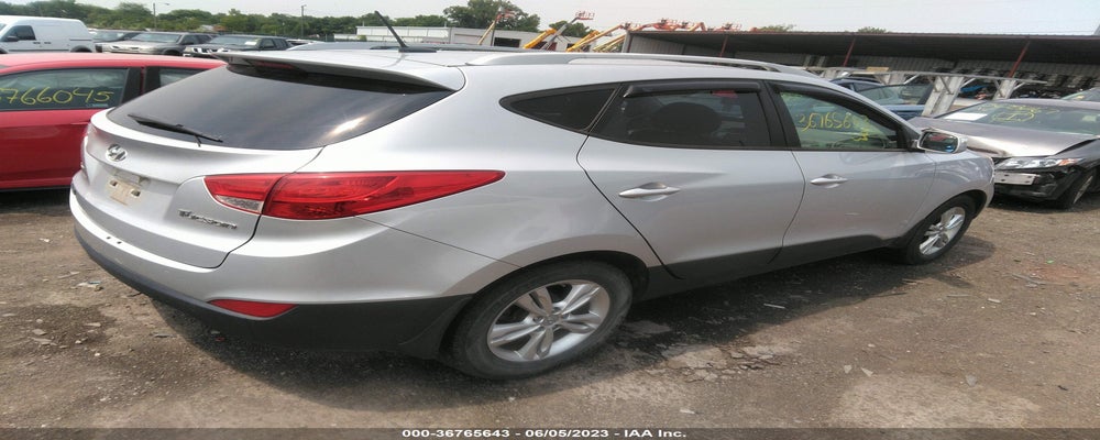 KM8JU3AC9CU388454 2012 HYUNDAI TUCSON photo no. 4