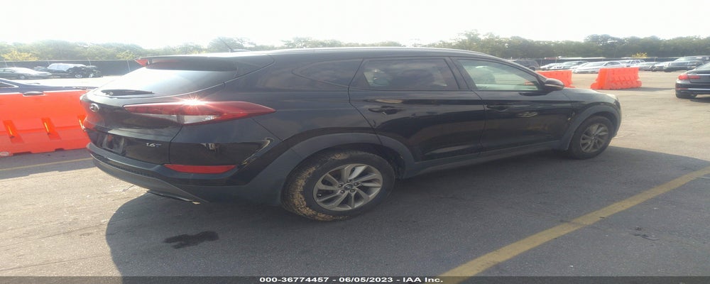KM8J33A22GU179945 2016 HYUNDAI TUCSON photo no. 4