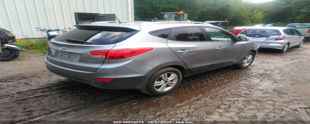 KM8JU3AC2CU517957 2012 HYUNDAI TUCSON photo no. 4