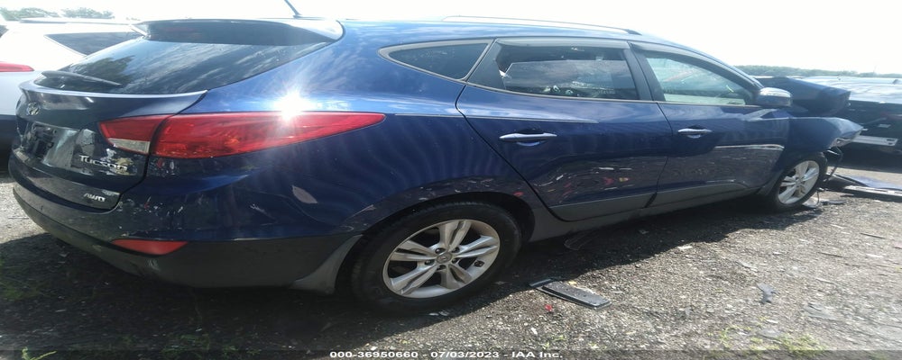 KM8JUCAC4CU445904 2012 HYUNDAI TUCSON photo no. 4