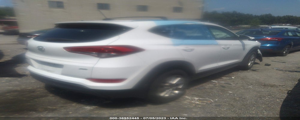 KM8J3CA40HU291775 2017 HYUNDAI TUCSON photo no. 4