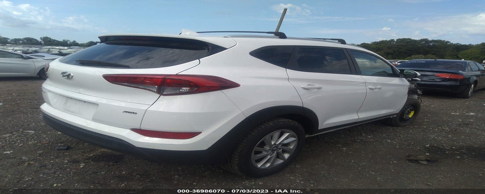KM8J3CA41JU761964 2018 HYUNDAI TUCSON photo no. 4