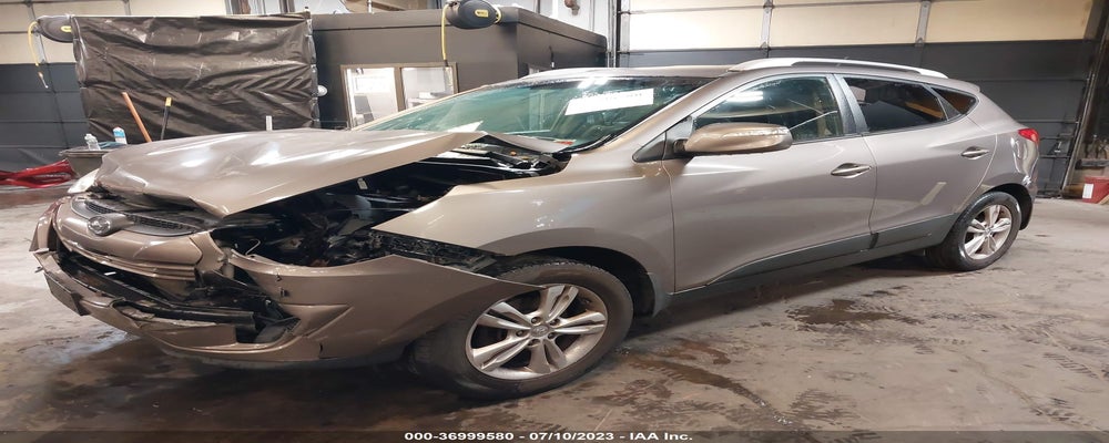 KM8JUCAC8CU341559 2012 HYUNDAI TUCSON photo no. 2