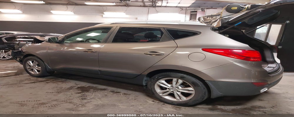 KM8JUCAC8CU341559 2012 HYUNDAI TUCSON photo no. 3