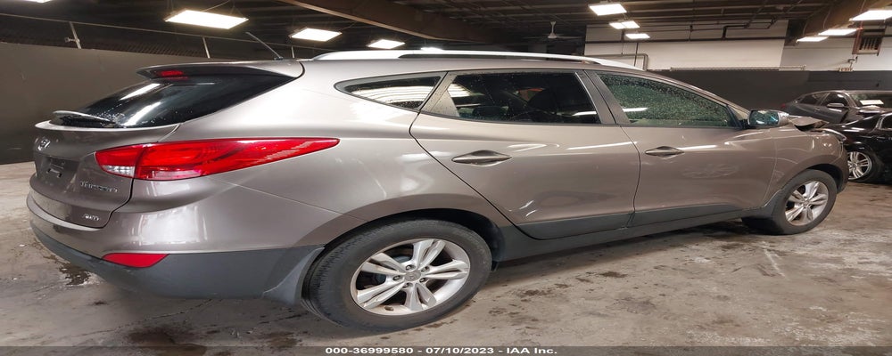 KM8JUCAC8CU341559 2012 HYUNDAI TUCSON photo no. 4